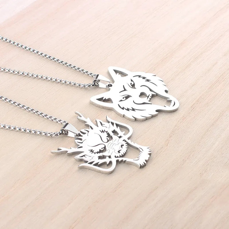 Hollow wolf head stainless steel pendant necklace with polished finish and 60cm chain on neutral background