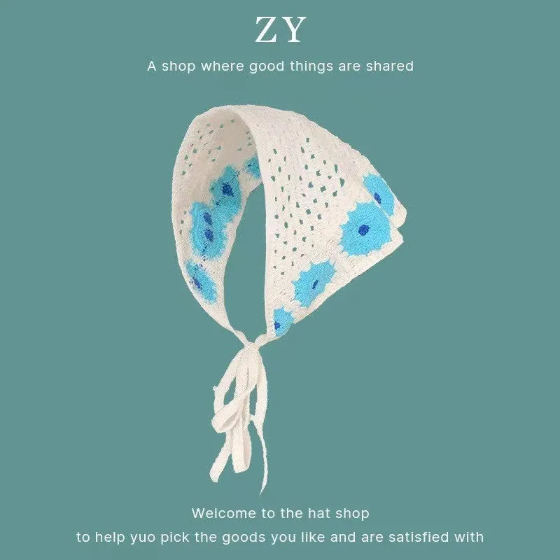 Women's cotton triangular headscarf with floral pattern, shown in beige blue little daisy design.