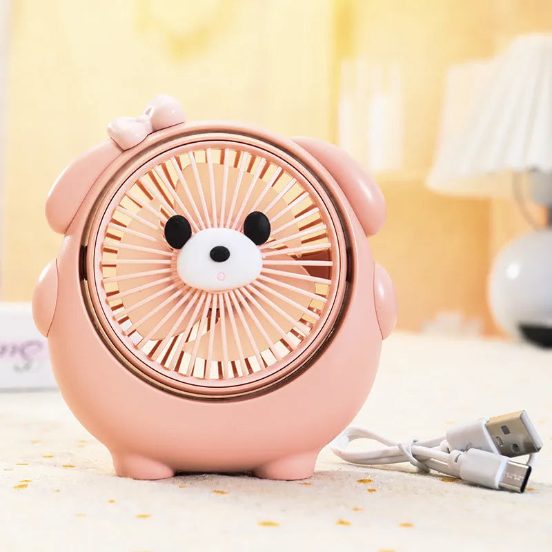 Cute dog-themed USB desktop electric fan on a desk, showing brown puppy colour variant.