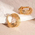 Geometric women's earrings with twisted round hollow stud design in silver or gold finish