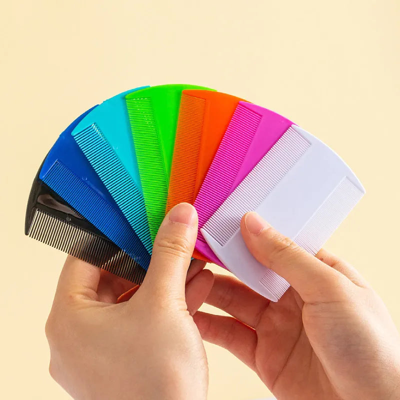 Double-sided fine tooth plastic comb for lice and fleas in various colours on a white background.