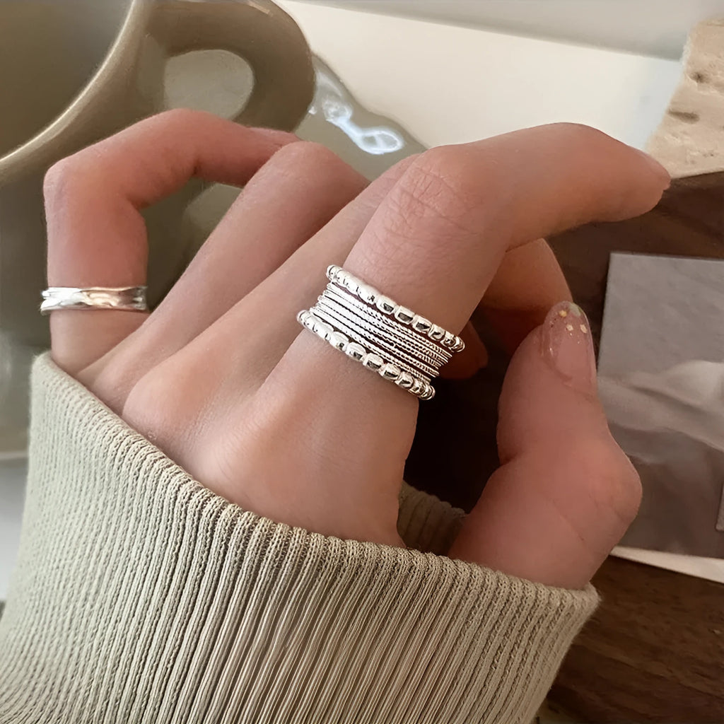 Copper alloy adjustable ring with geometric woven multilayer design