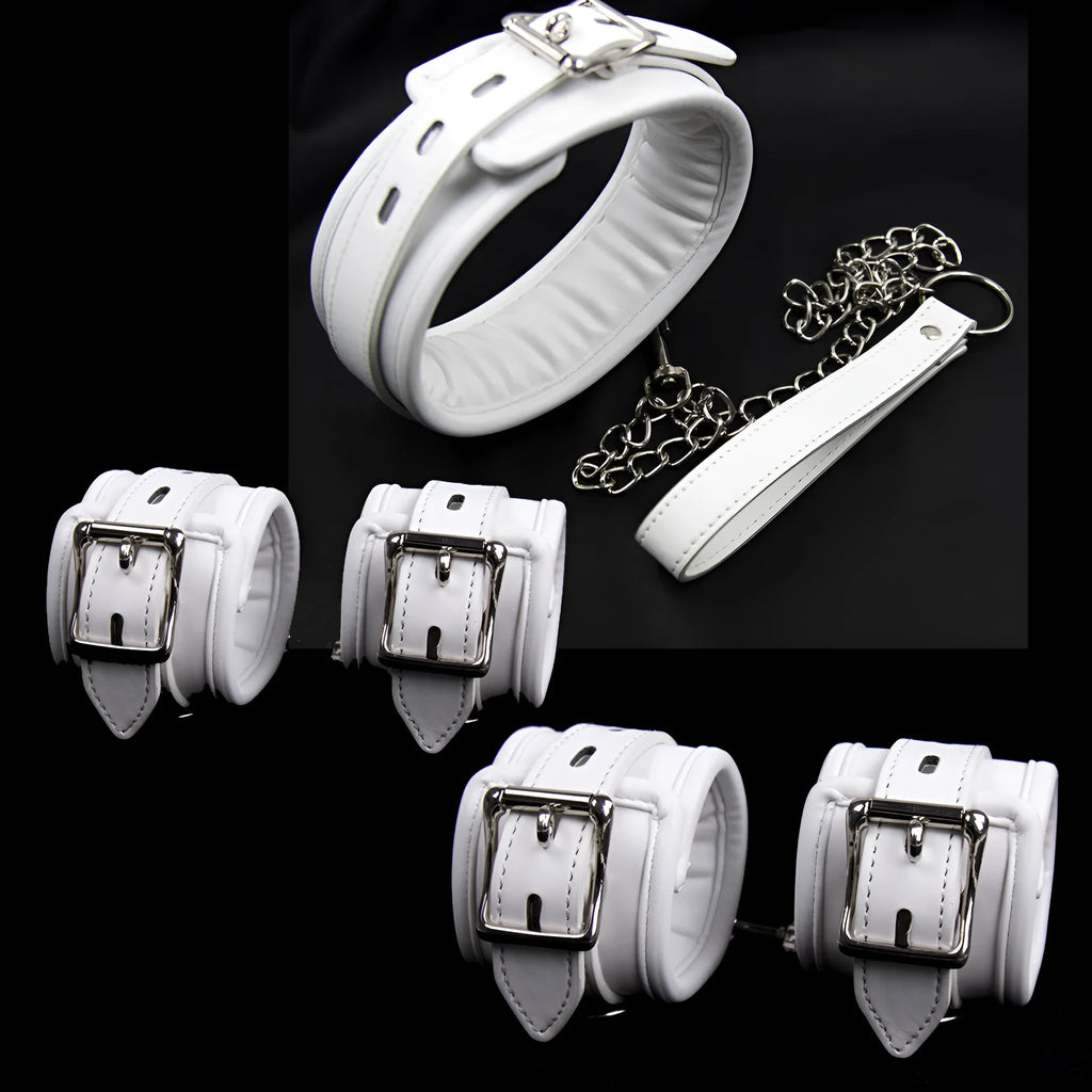 White PU sponge bondage restraint set showing handcuffs, footcuffs and neck cuff accessories