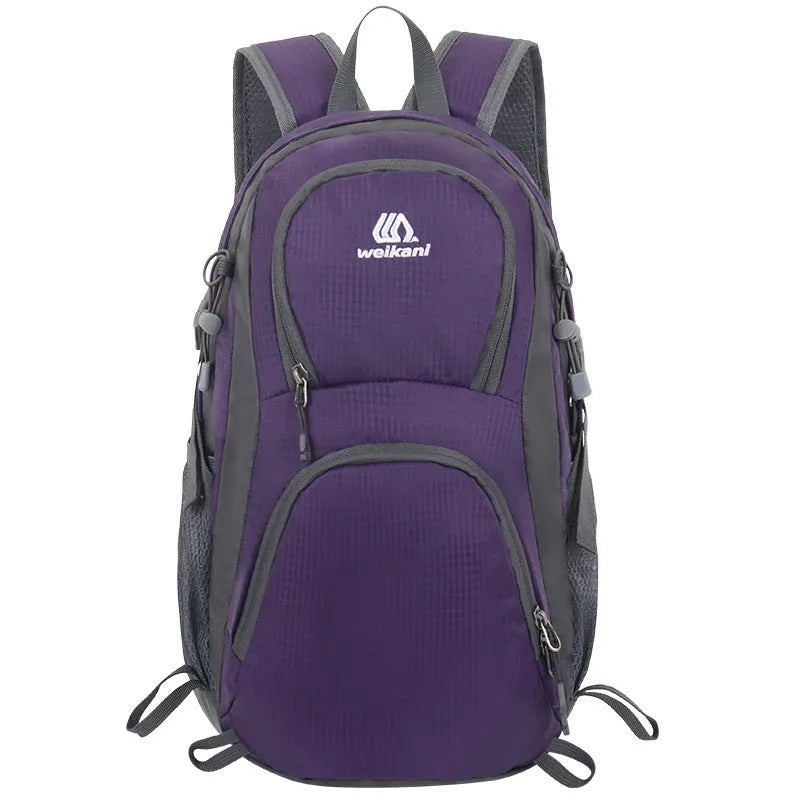 Black outdoor backpack with air pillow belt, shown with other colour options: blue, dark blue, lake blue, orange, and purple.