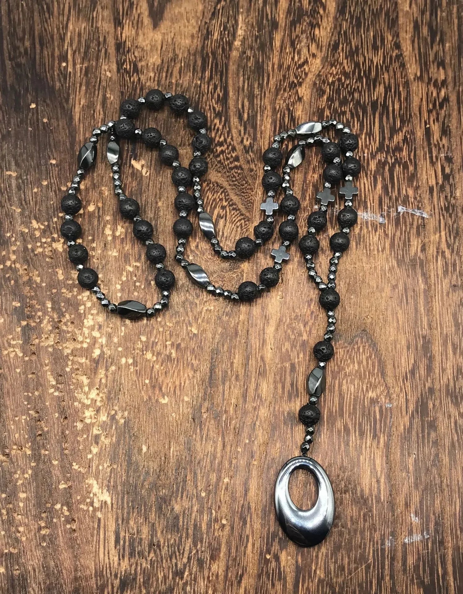 Men's stone geometric cross pendant on an 80cm ball bead chain with safety lock.