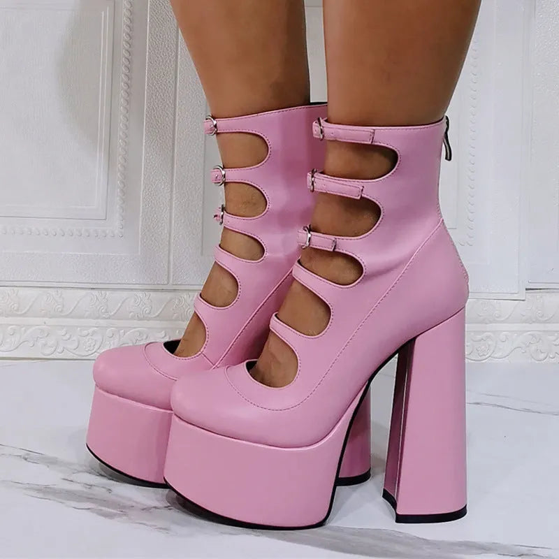 Women's black patent leather platform high heels with a thick heel and buckle-fastened serpentine belt.
