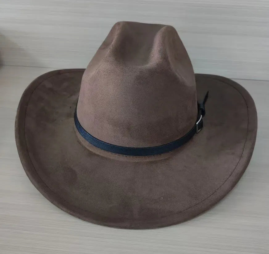 Brown leather velvet western cowboy hat with a curved brim and conical crown on a neutral background.