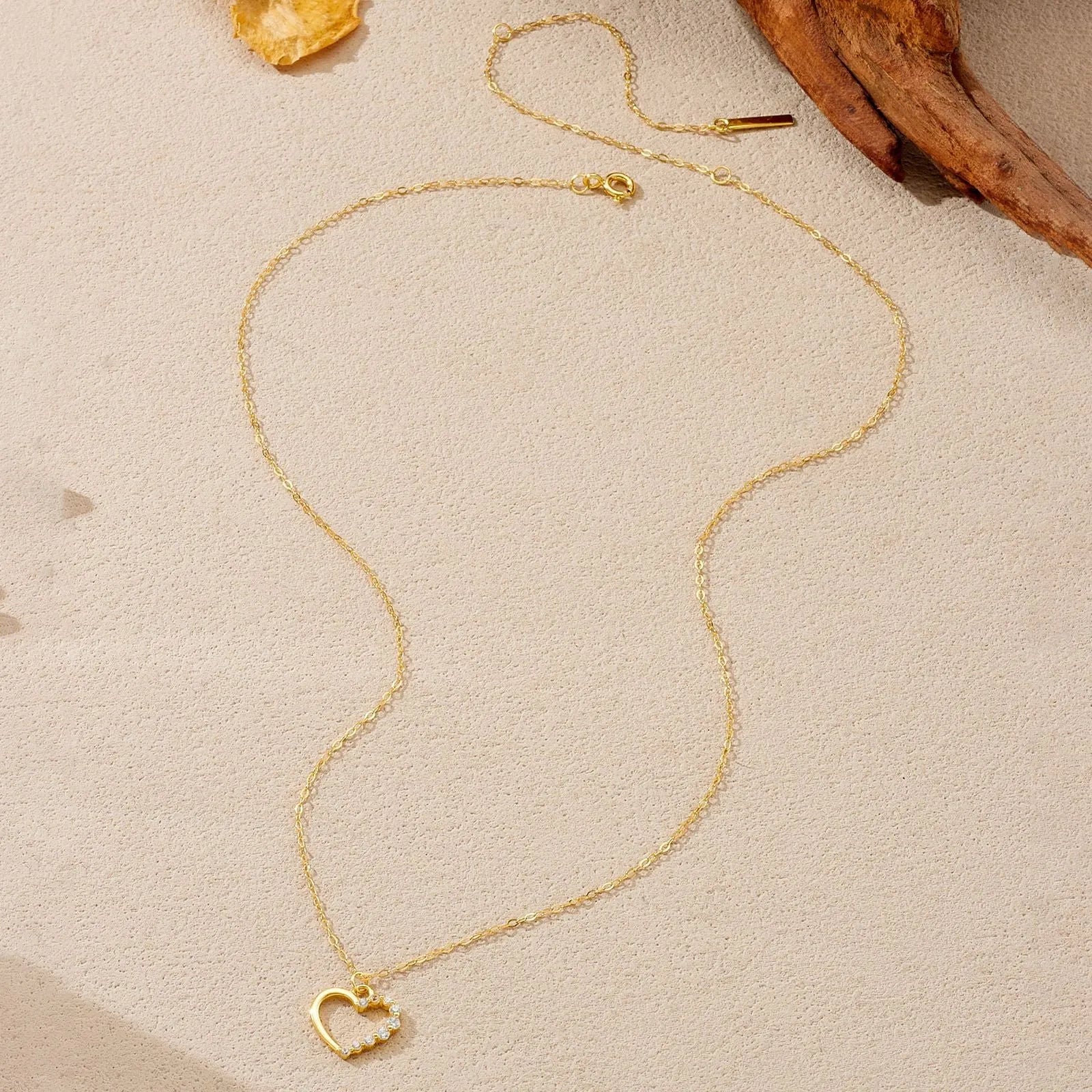 S925 sterling silver hollow heart necklace with circle detailing on regular chain
