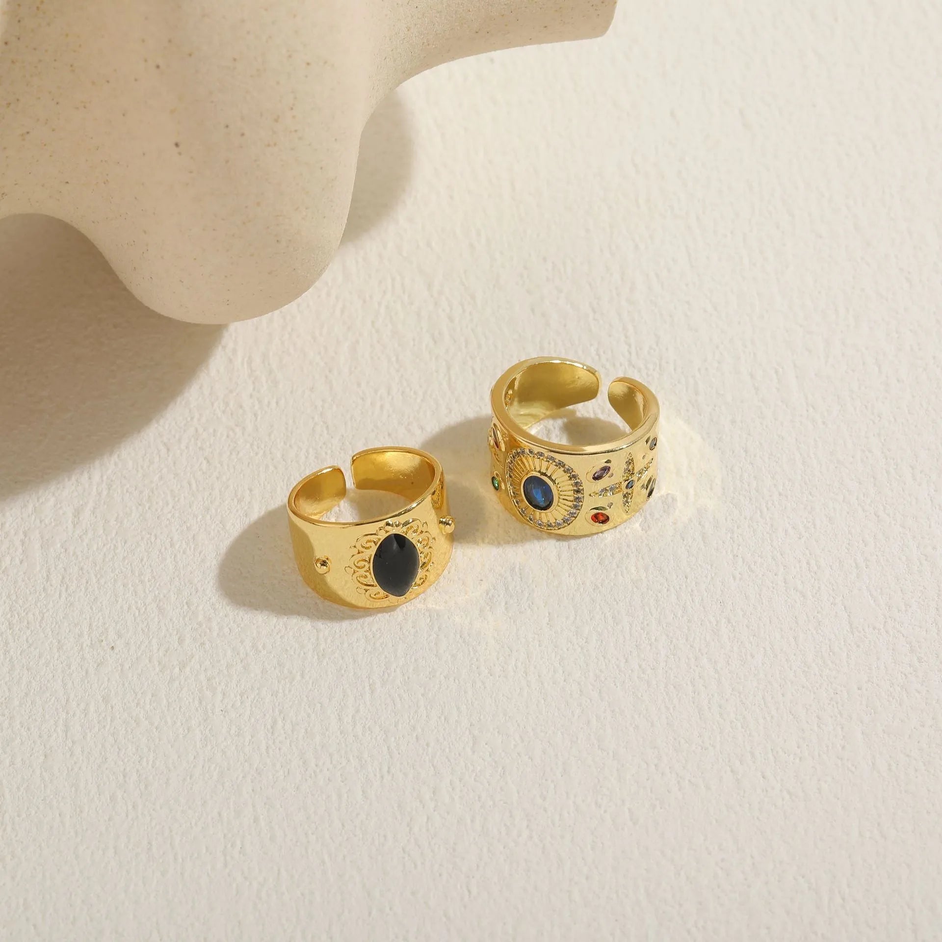 Geometric copper ring with Chinese style design and electroplated finish in horse eye black colour