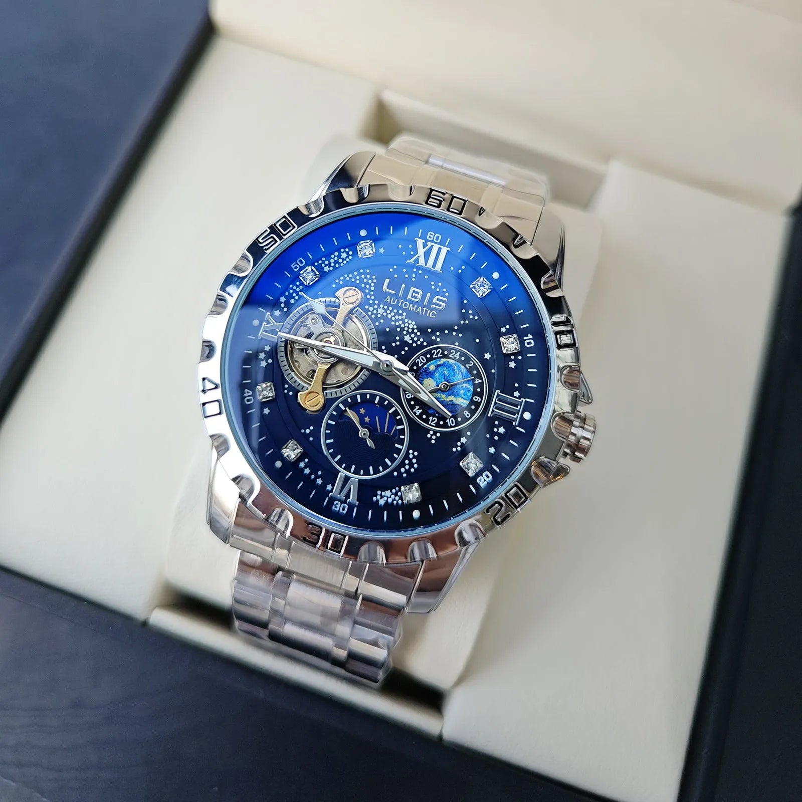 Men's silver case automatic mechanical watch with black starry dial and steel belt strap
