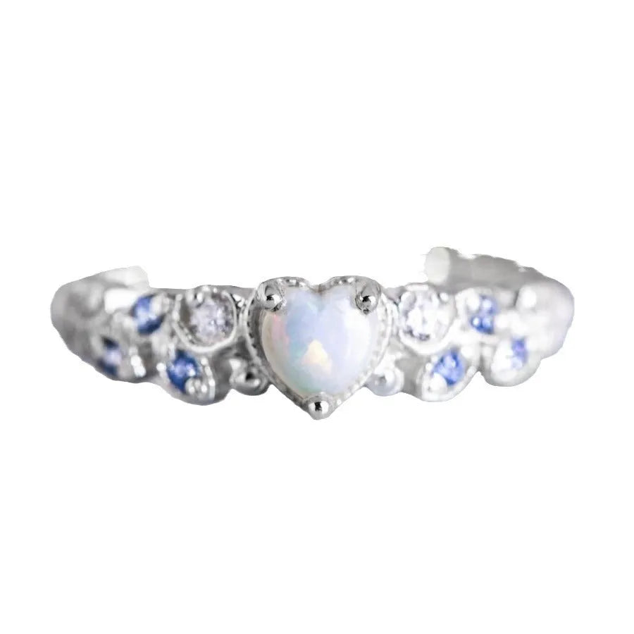 Peach-coloured women's heart-shaped alloy ring with floral and opal ocean design details.