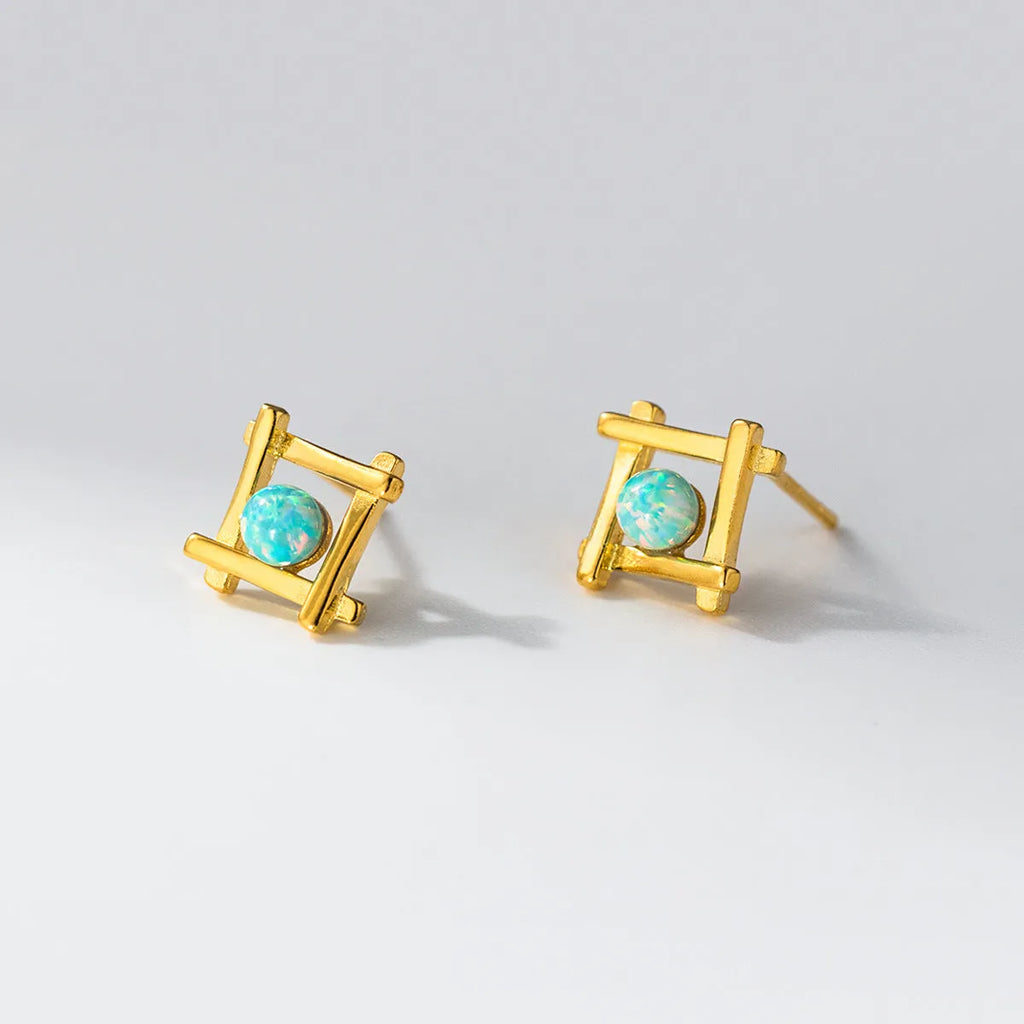 Women's geometric cross quadrangle stud earrings in 925 silver with butterfly clutch closures