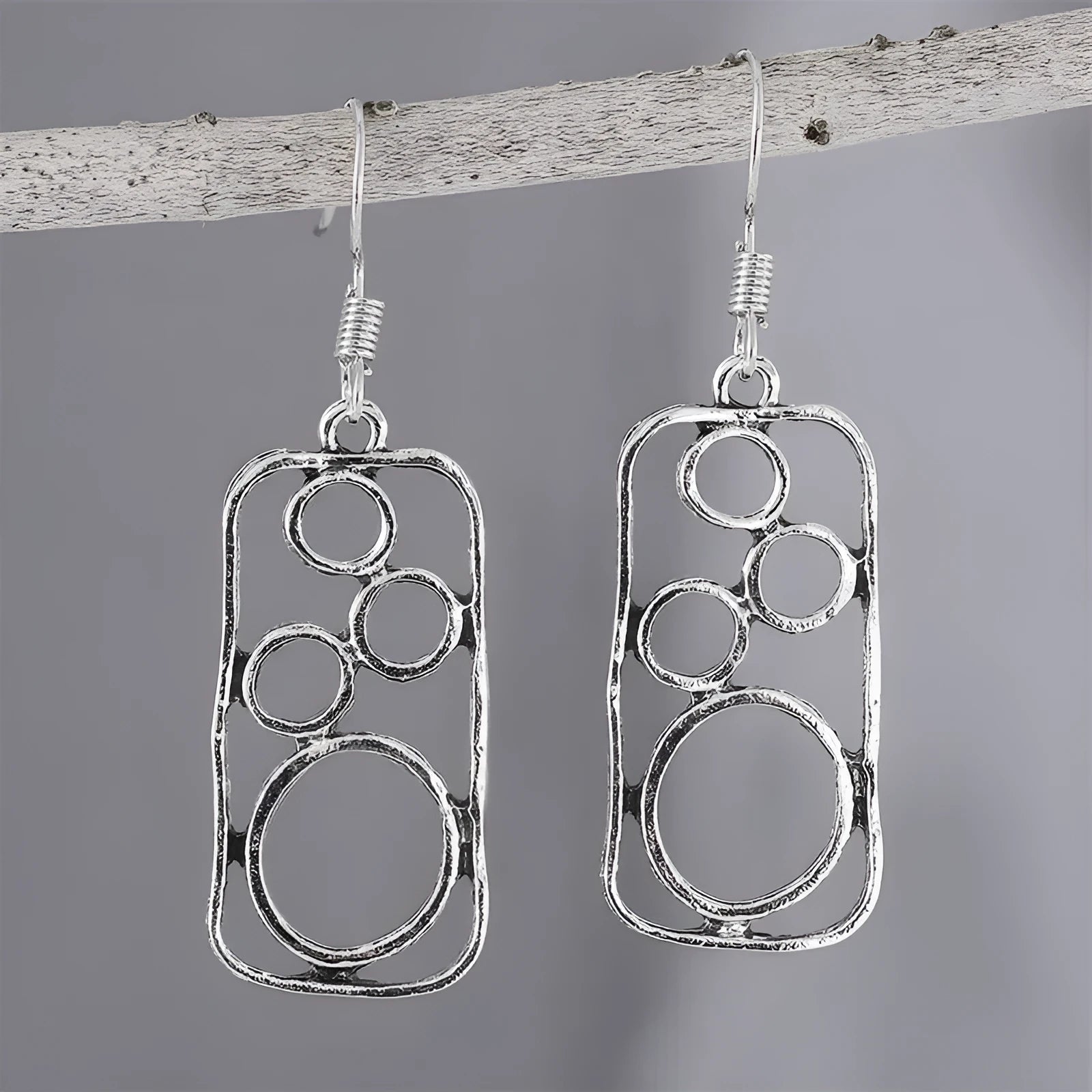 Geometric irregular square earrings within circular ring, antique silver finish on zinc alloy