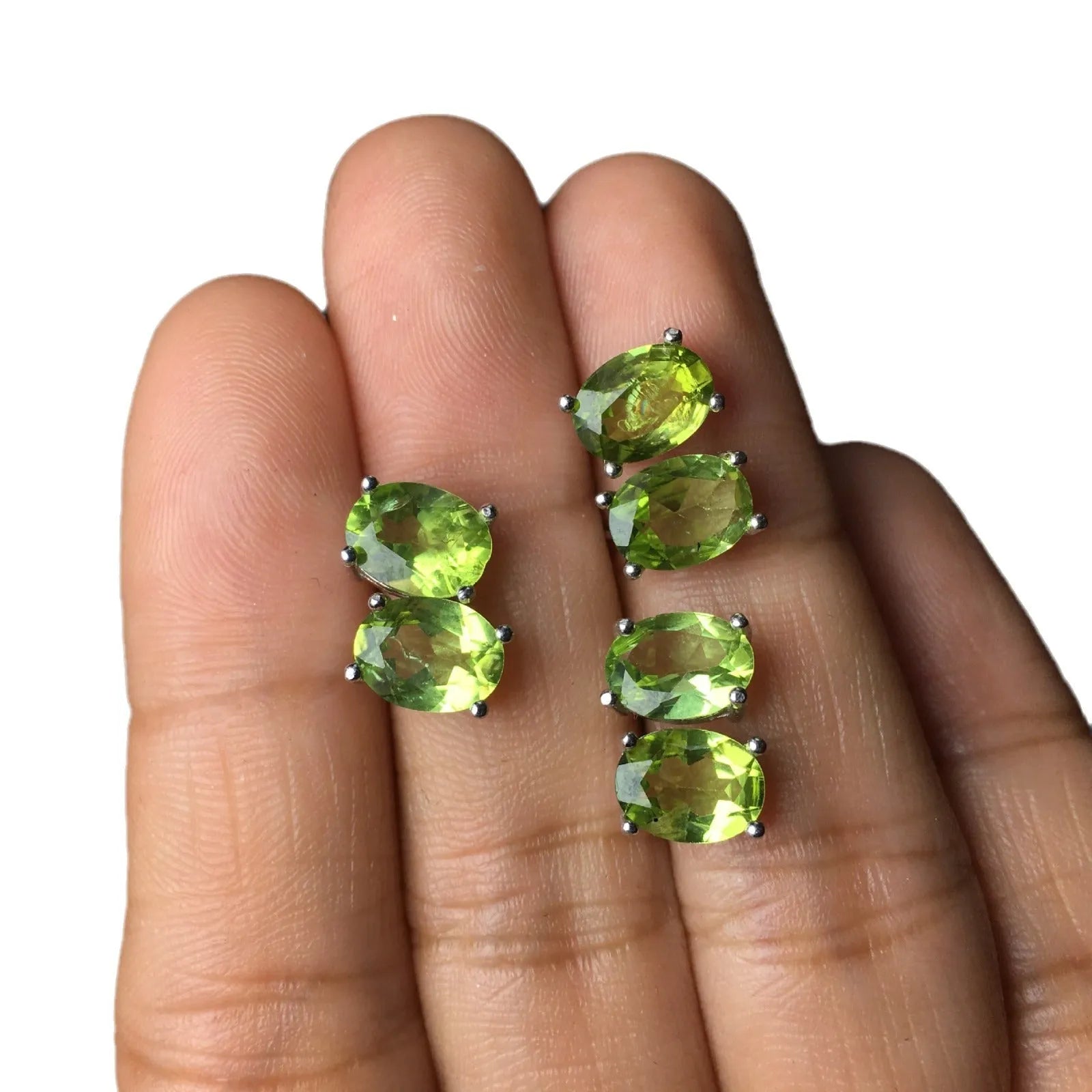 Grass green natural Olivine faceted stud earrings in S925 sterling silver settings.