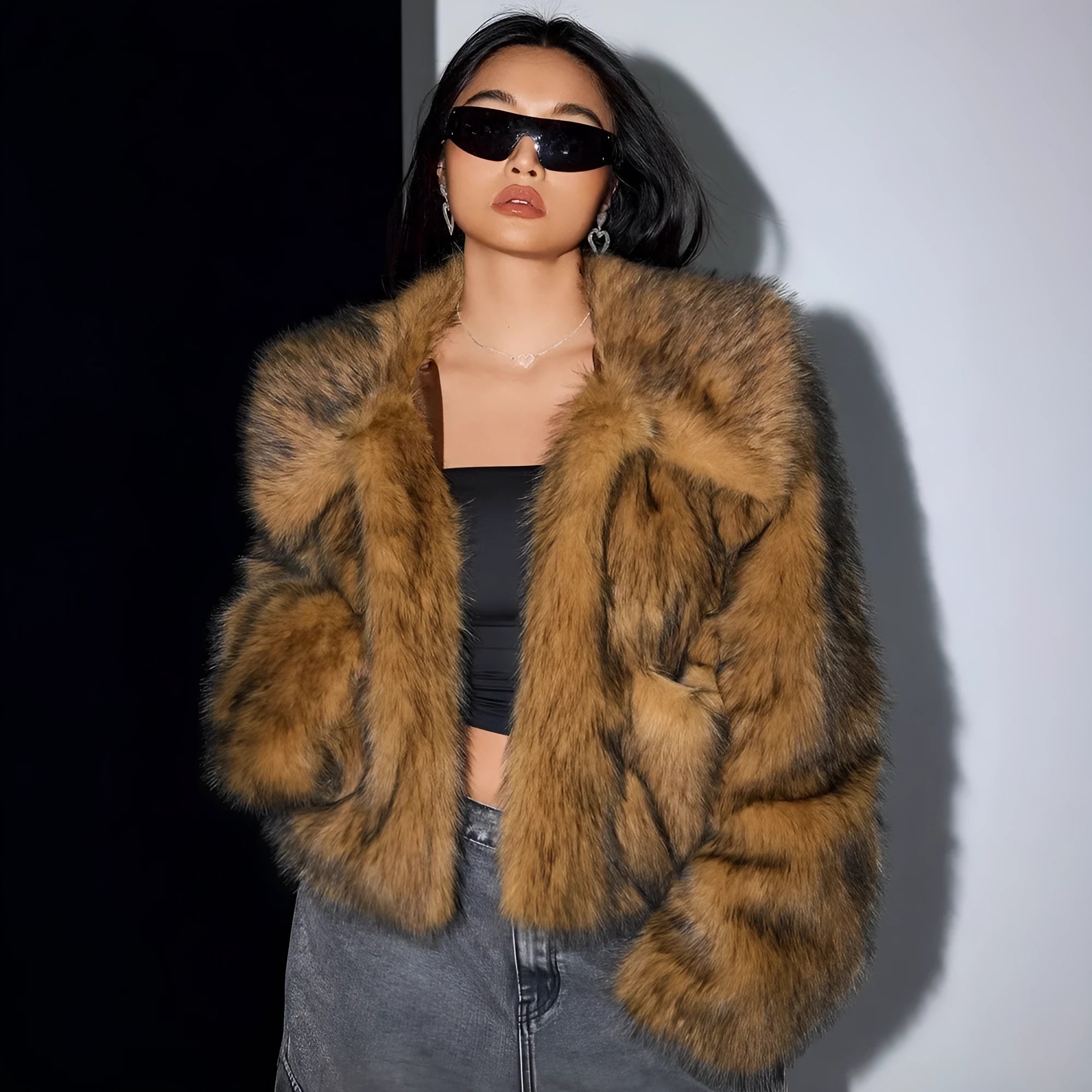 Women's faux fur coat with fur collar in black tip on black background colour