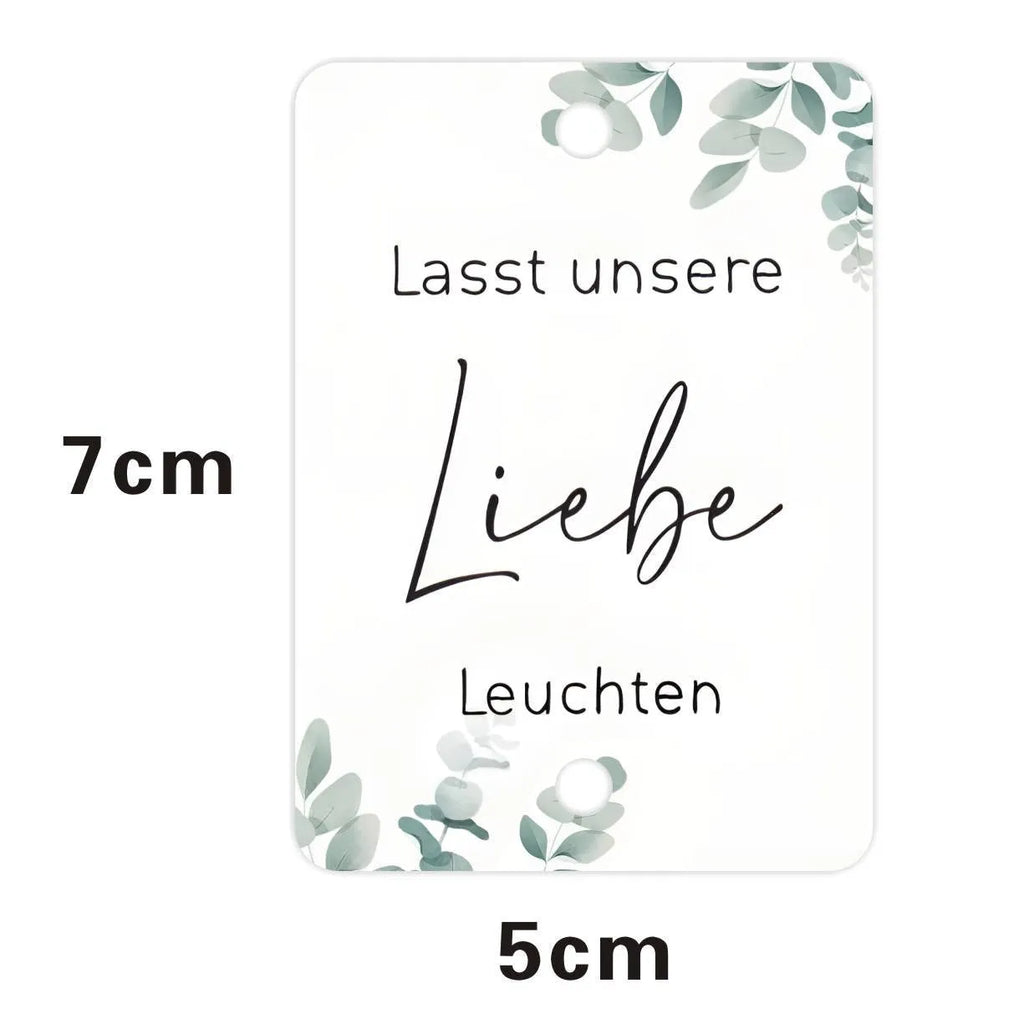 White decorative paper labels with fireworks design and I Make Love sparkling text