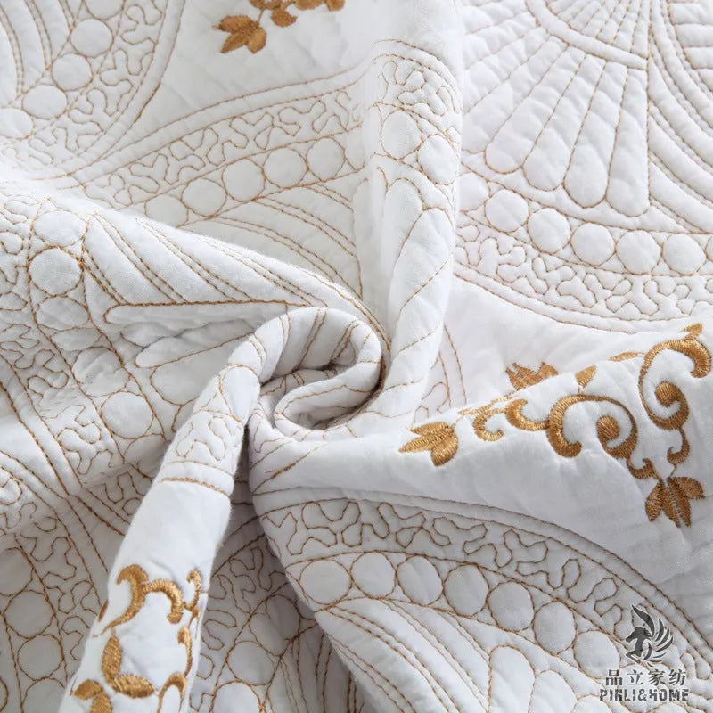 European-style cotton embroidered bedspread and pillowcase set on a 1.8 metre bed.