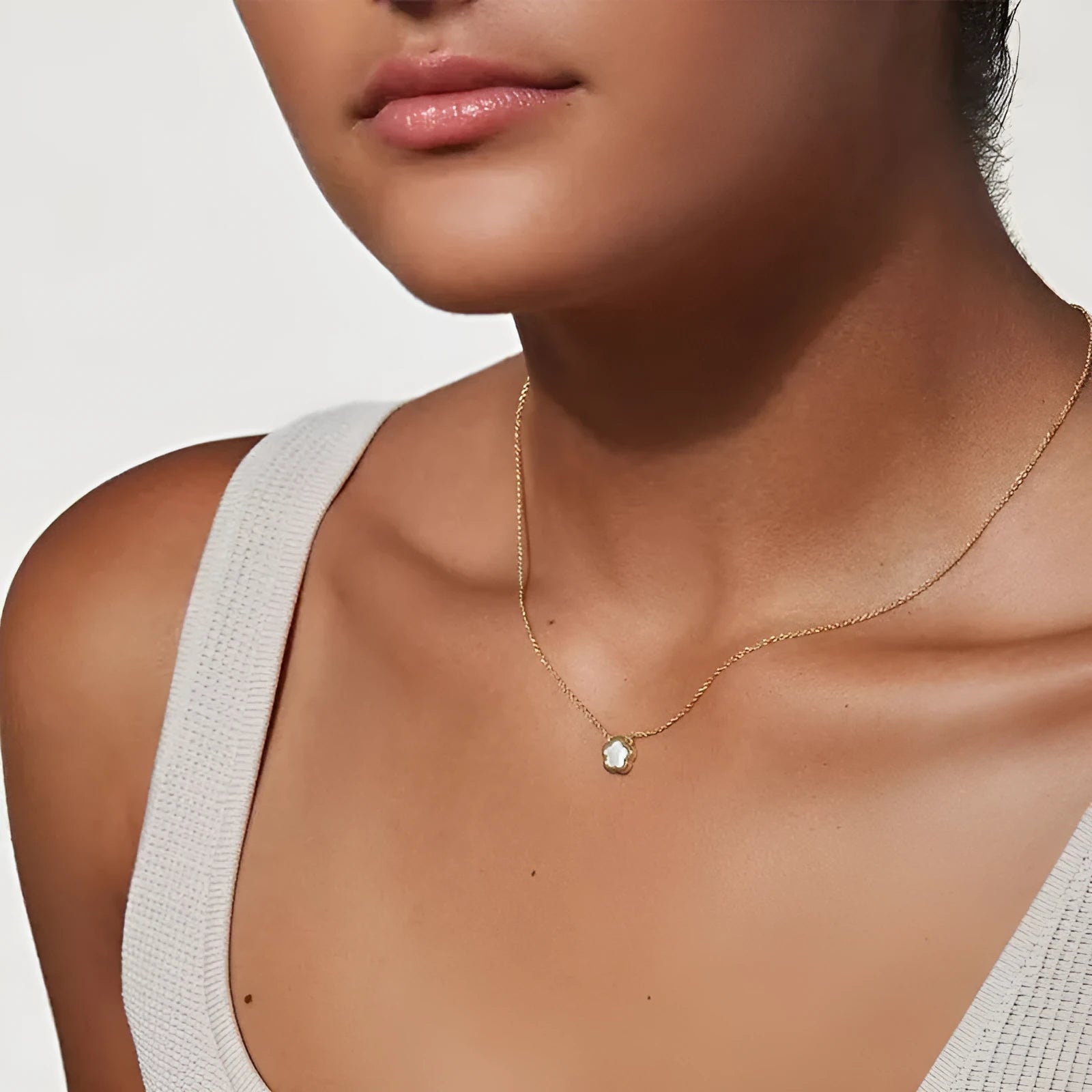 Mother of pearl shell flower necklace with gold or silver finish on O-shaped chain