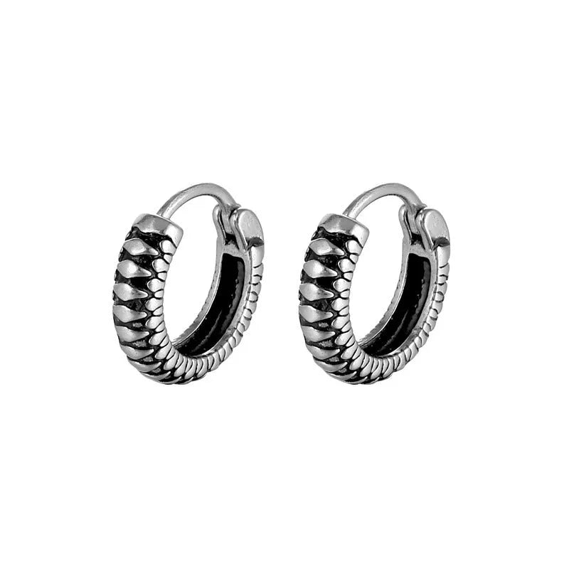 Silver geometric retro twist earrings with stripe detail, made from titanium steel.