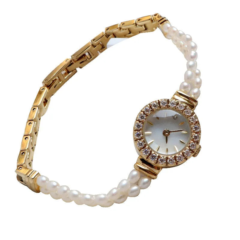 Light gold women's bracelet watch with freshwater pearls and 18mm round dial