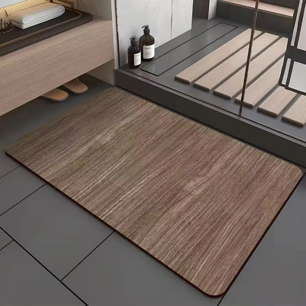 Square diatom ooze floor mat with geometric wood grain pattern in a bathroom setting.