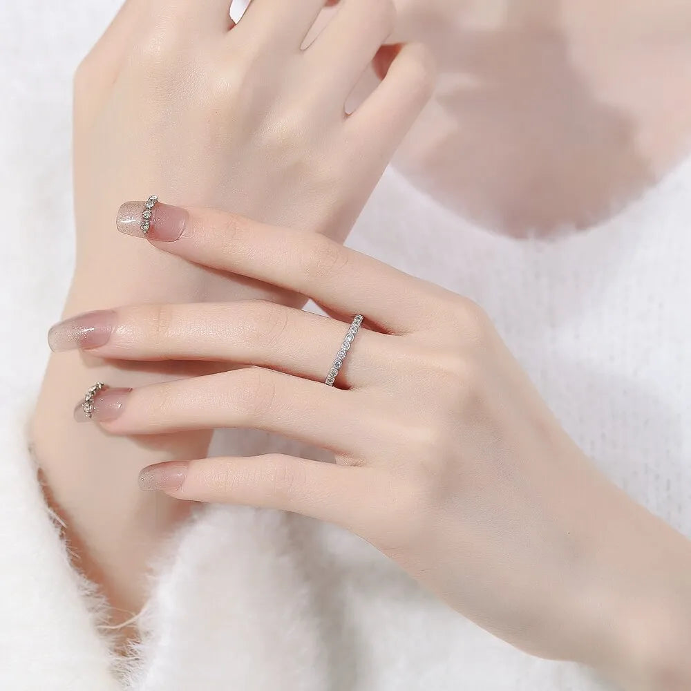 Simple geometric Korean style adjustable open mouth ring with diamond tail detail in white gold or yellow gold colour
