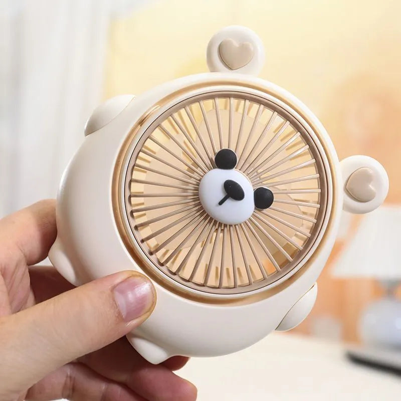 Cute dog-themed USB desktop electric fan on a desk, showing brown puppy colour variant.