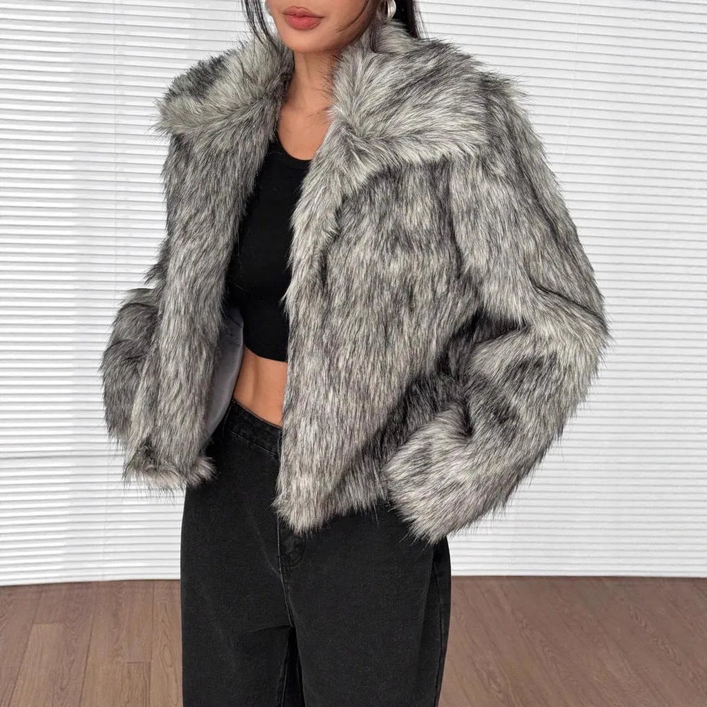 Women's faux fur coat with fur collar in black tip on black background colour