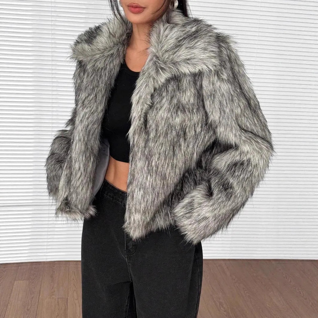 Women's faux fur coat with fur collar in black tip on black background colour