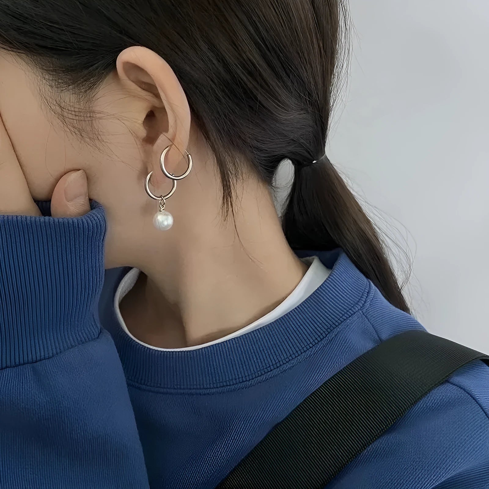 Geometric alloy drop earrings for women with round titanium steel pearl accents.