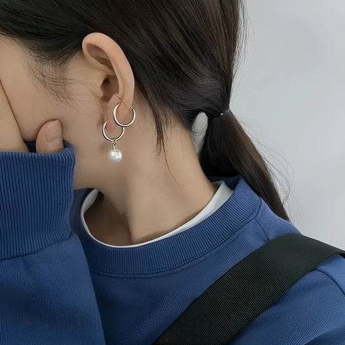 Geometric alloy drop earrings for women with round titanium steel pearl accents.
