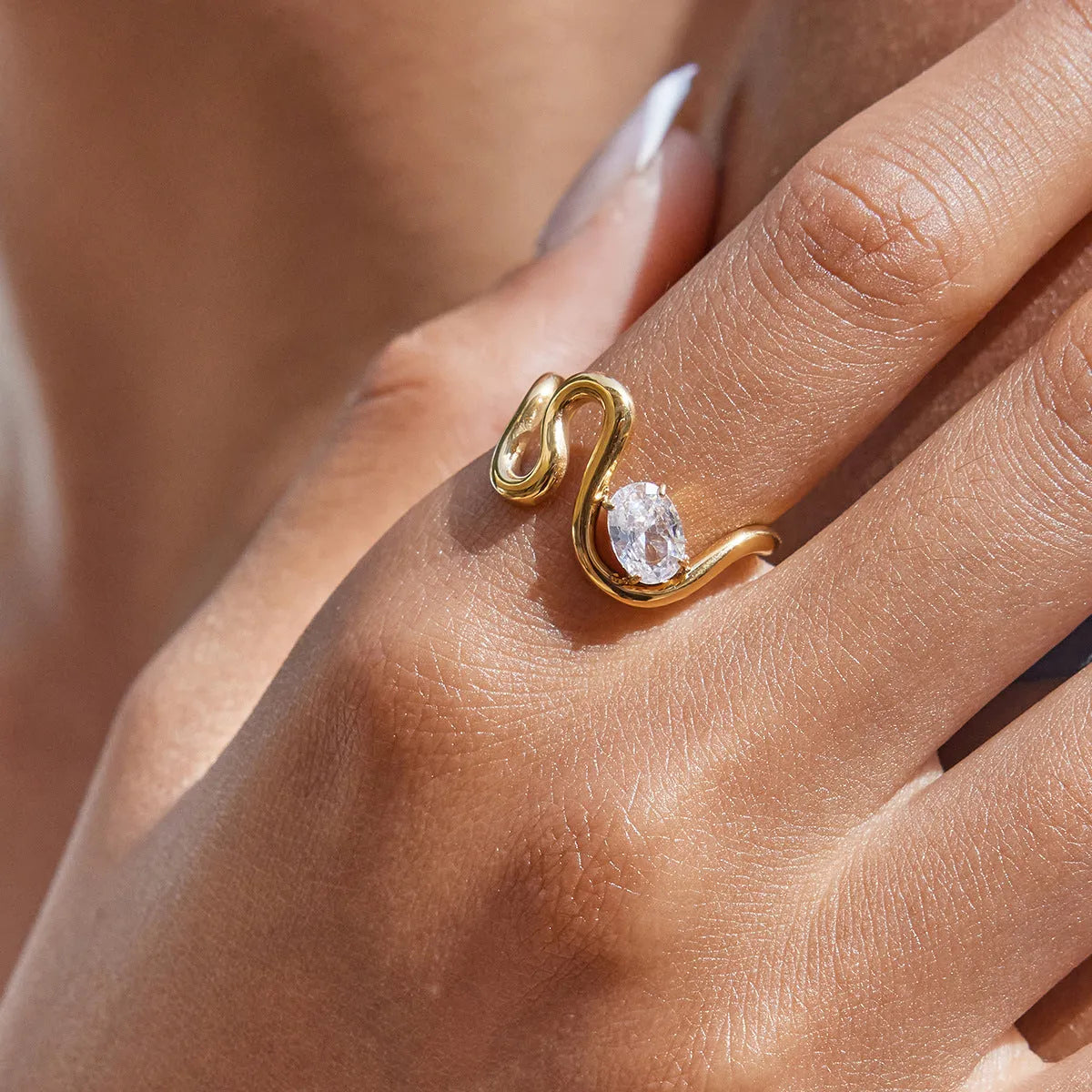 Silver tone geometric zircon ring with European-American styling on stainless steel background