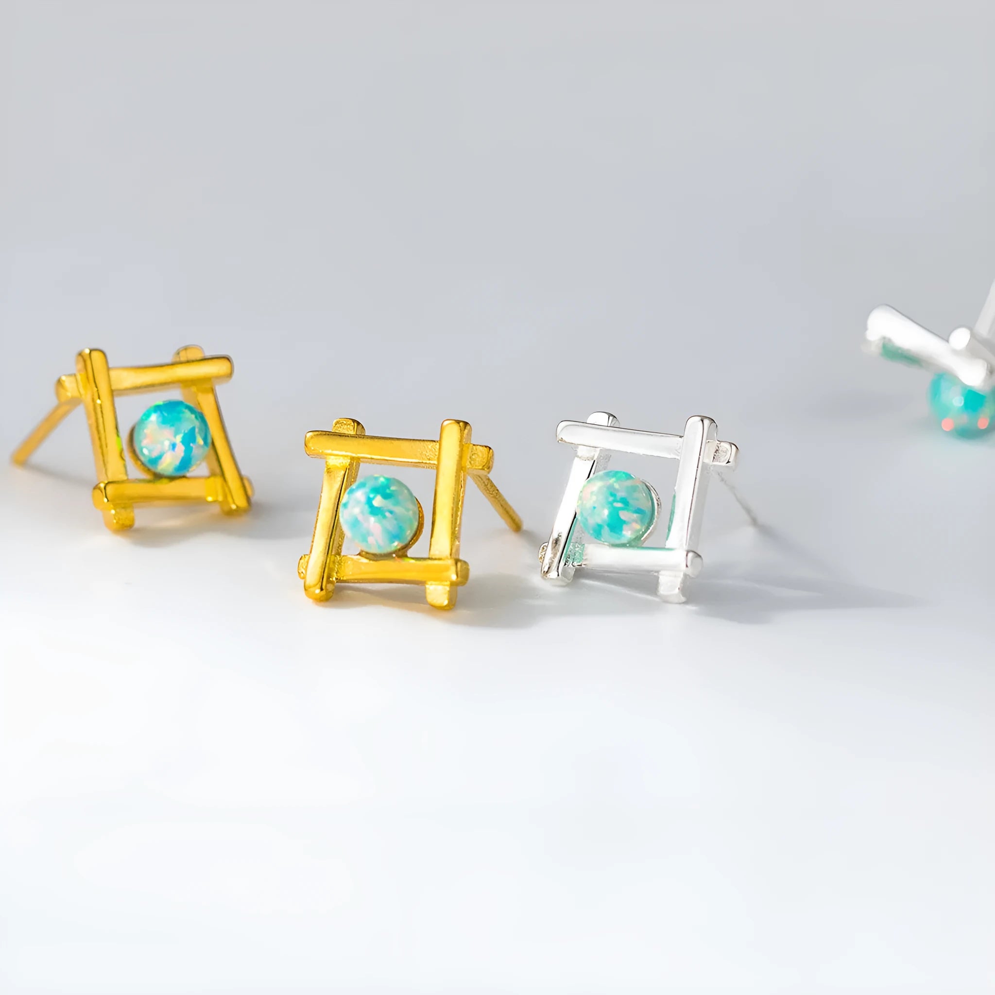 Women's geometric cross quadrangle stud earrings in 925 silver with butterfly clutch closures
