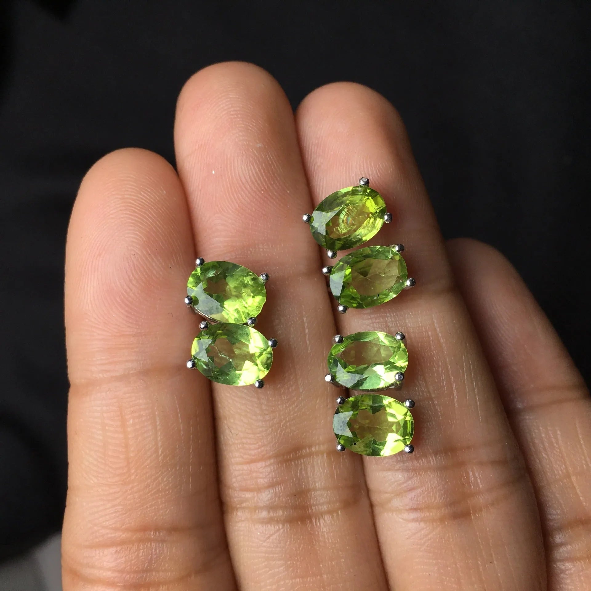 Grass green natural Olivine faceted stud earrings in S925 sterling silver settings.