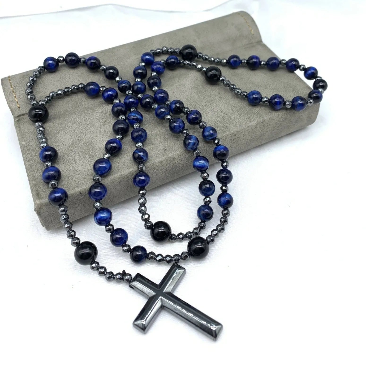 Men's stone geometric cross pendant on an 80cm ball bead chain with safety lock.