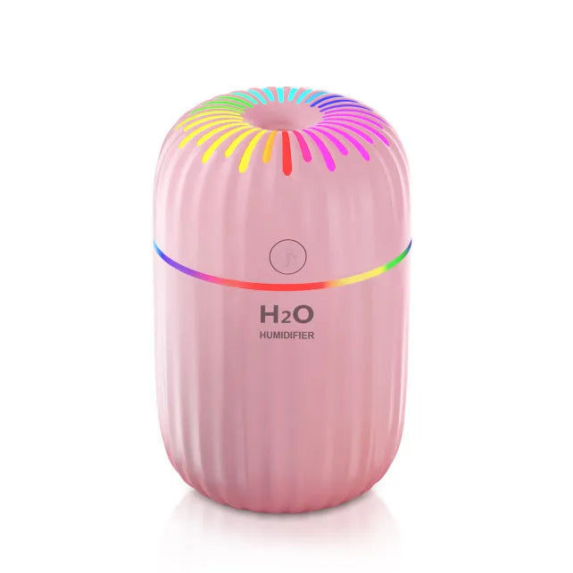 Small green animal-shaped USB aromatherapy humidifier with compact plastic build.