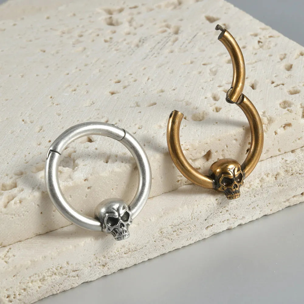Copper punk earrings with antique silver finish and ghost head design