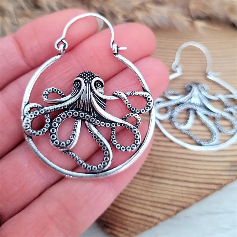 Vintage style octopus drop earrings in antique silver colour with detailed tentacle design