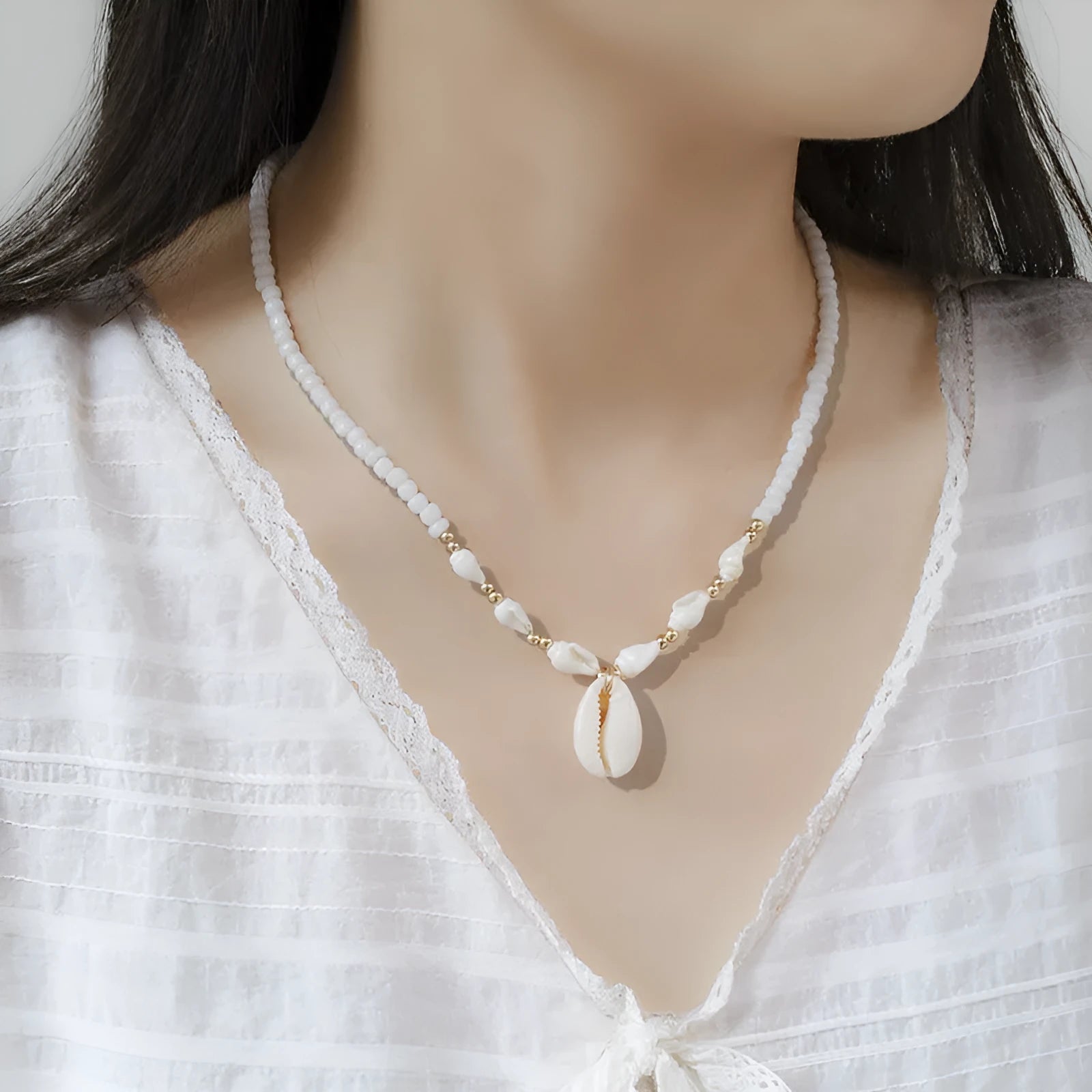 White conch shell necklace with mother of pearl pendant on regular chain, electroplated finish