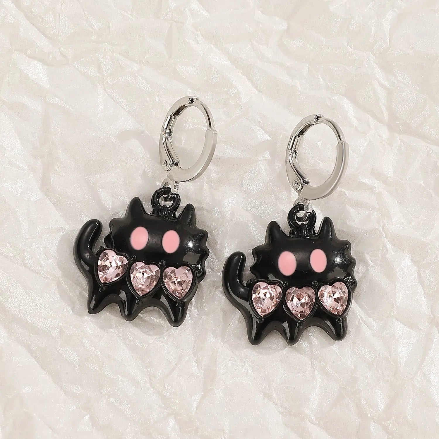 Women's alloy earrings with crystal cross designs in five colour options including white, peach heart, and antique silver