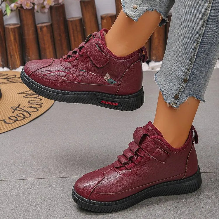 Women's black and red velvet slipper shoes with non-slip rubber soles and hollow out decorative elements