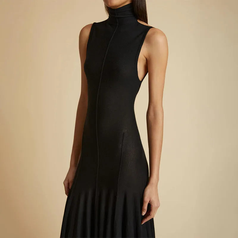 Grey women's slim-fit cotton dress with half turtleneck and backless design.