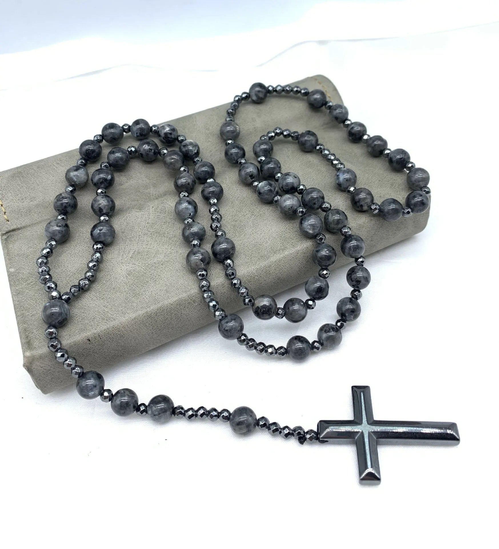 Men's stone geometric cross pendant on an 80cm ball bead chain with safety lock.