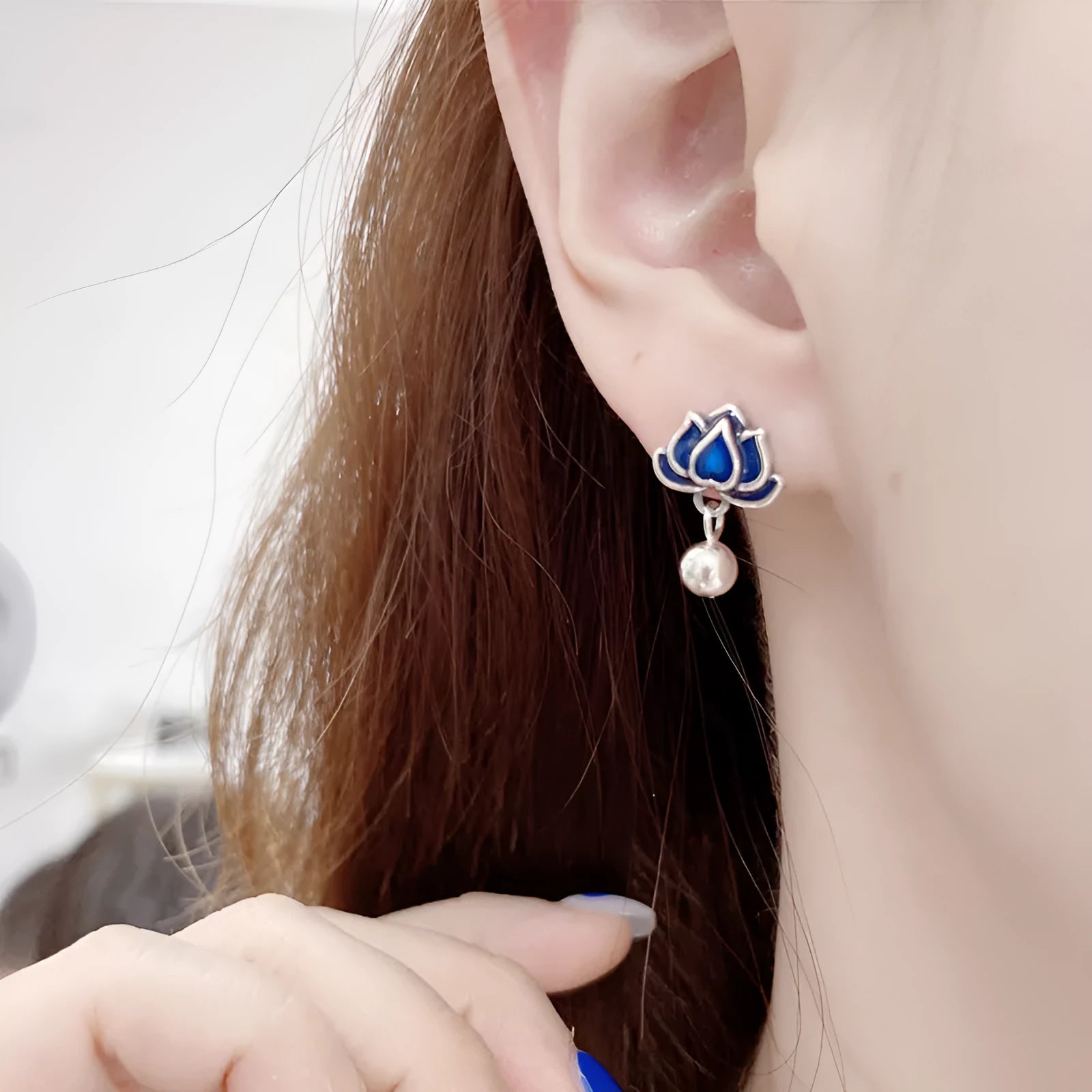 Blue Lotus alloy stud earrings with detailed lotus seedpod tassel and flower design