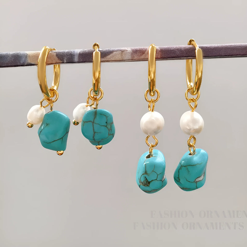 Geometric turquoise and cultured pearl earrings in short stud and long dangle styles on copper settings.