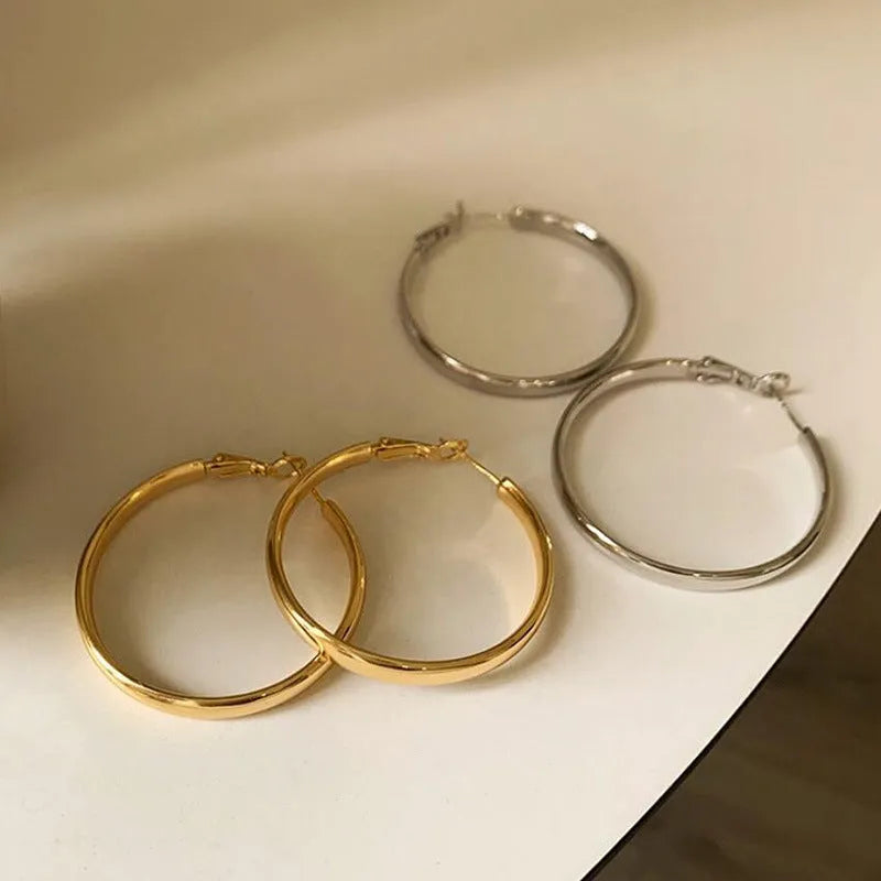 Gold and silver 40mm metal circle earrings with electroplated copper construction