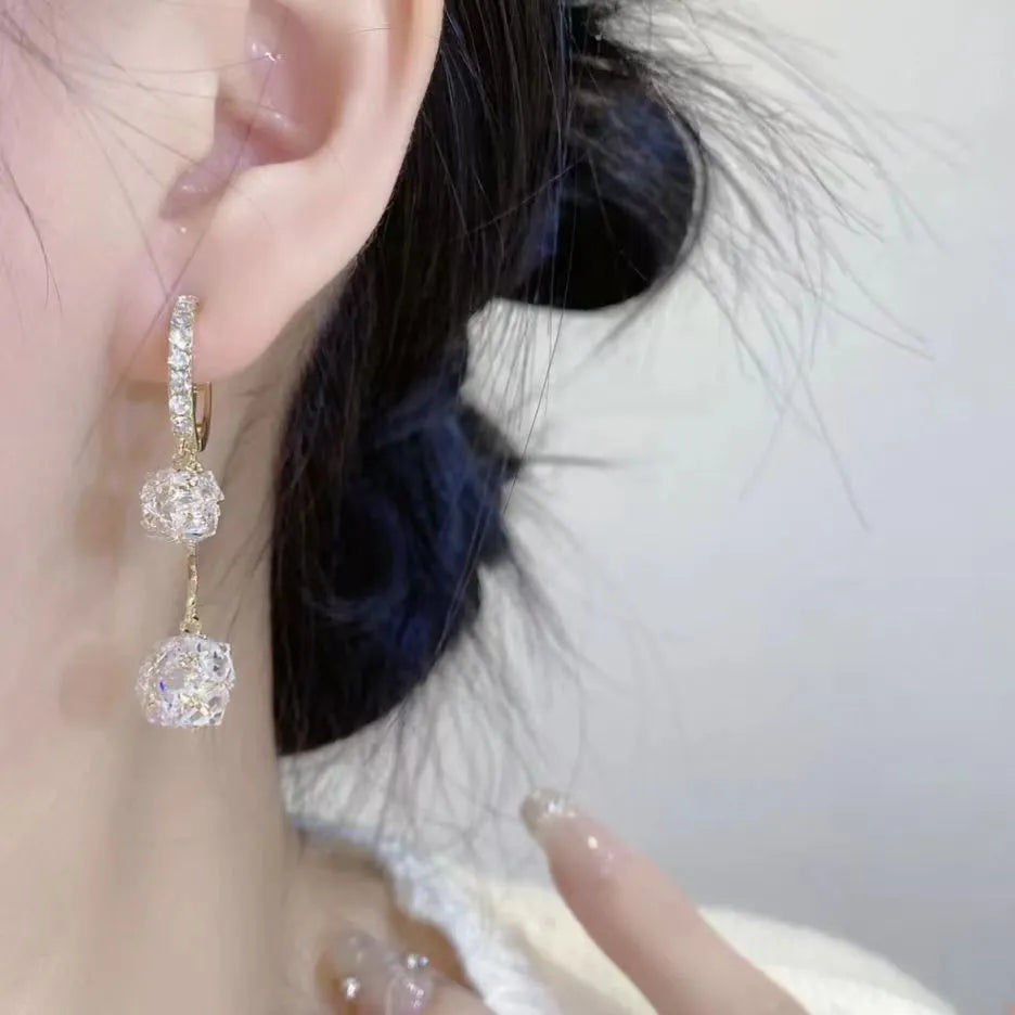 Silver women's earrings with tassel ball and rhinestone confession balloon pendant drop design