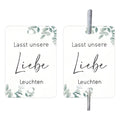 White decorative paper labels with fireworks design and I Make Love sparkling text