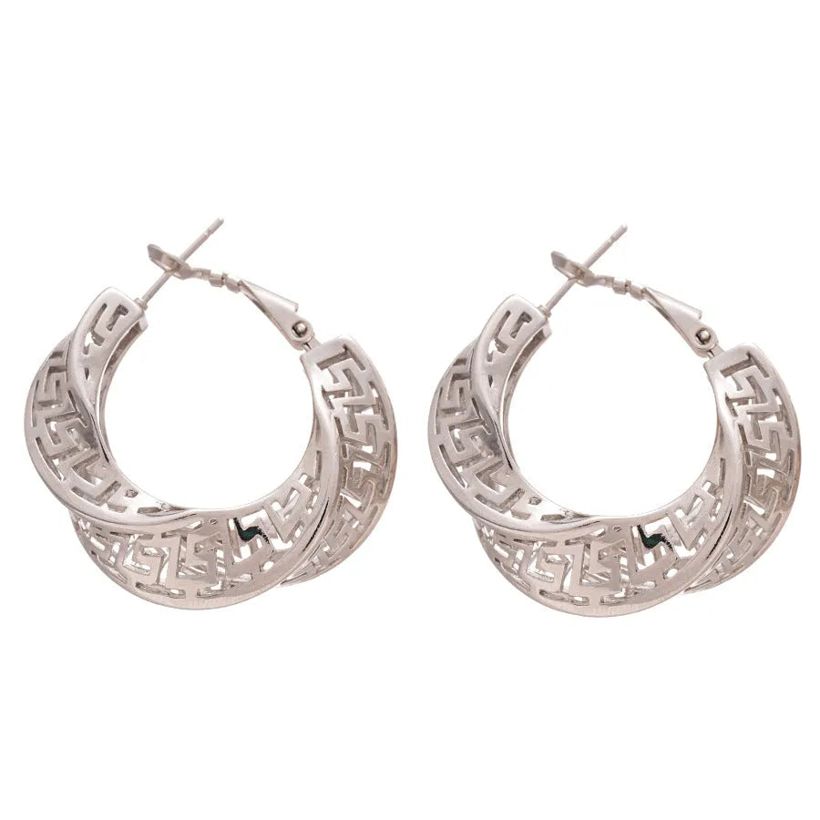 Geometric women's earrings with twisted round hollow stud design in silver or gold finish