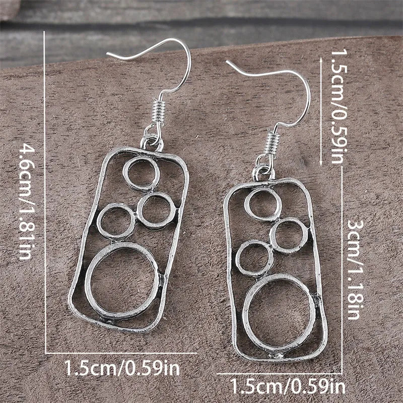 Geometric irregular square earrings within circular ring, antique silver finish on zinc alloy